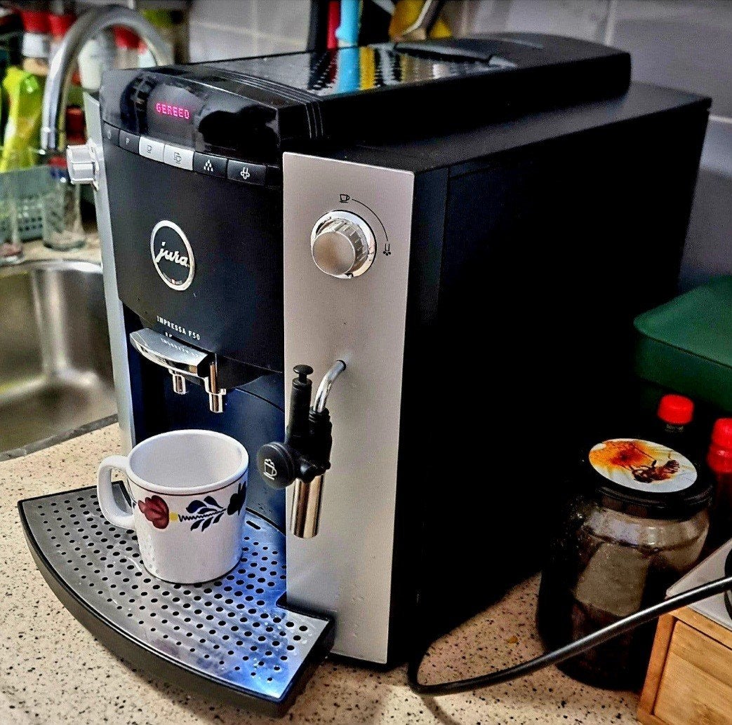 Jura Impressa F50 volledig automatische espressomachine., Stoompijpje, Espresso apparaat, Ophalen of Verzenden, Zo goed als nieuw
