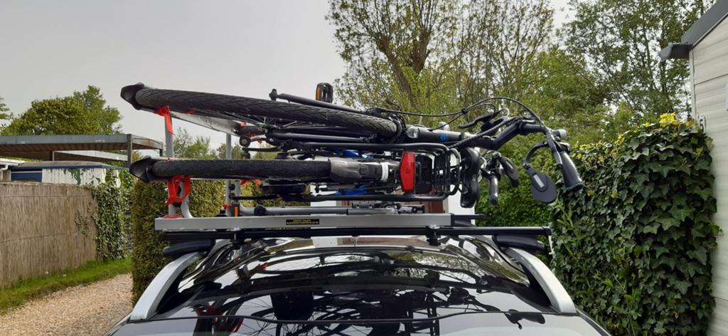 Fietsendrager liggend ophet dak, Ticket of Toegangskaart