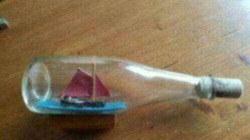 Flesjesschip Vissersschip in fles, Ophalen