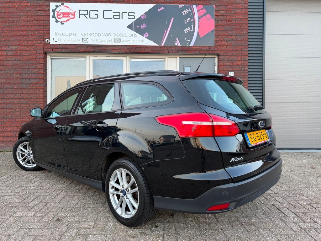 Ford Focus Wagon 1.0 Lease Edition / Navi / Carplay / PDC /, Gebruikt, Met garantie (alle), Zwart, Origineel Nederlands
