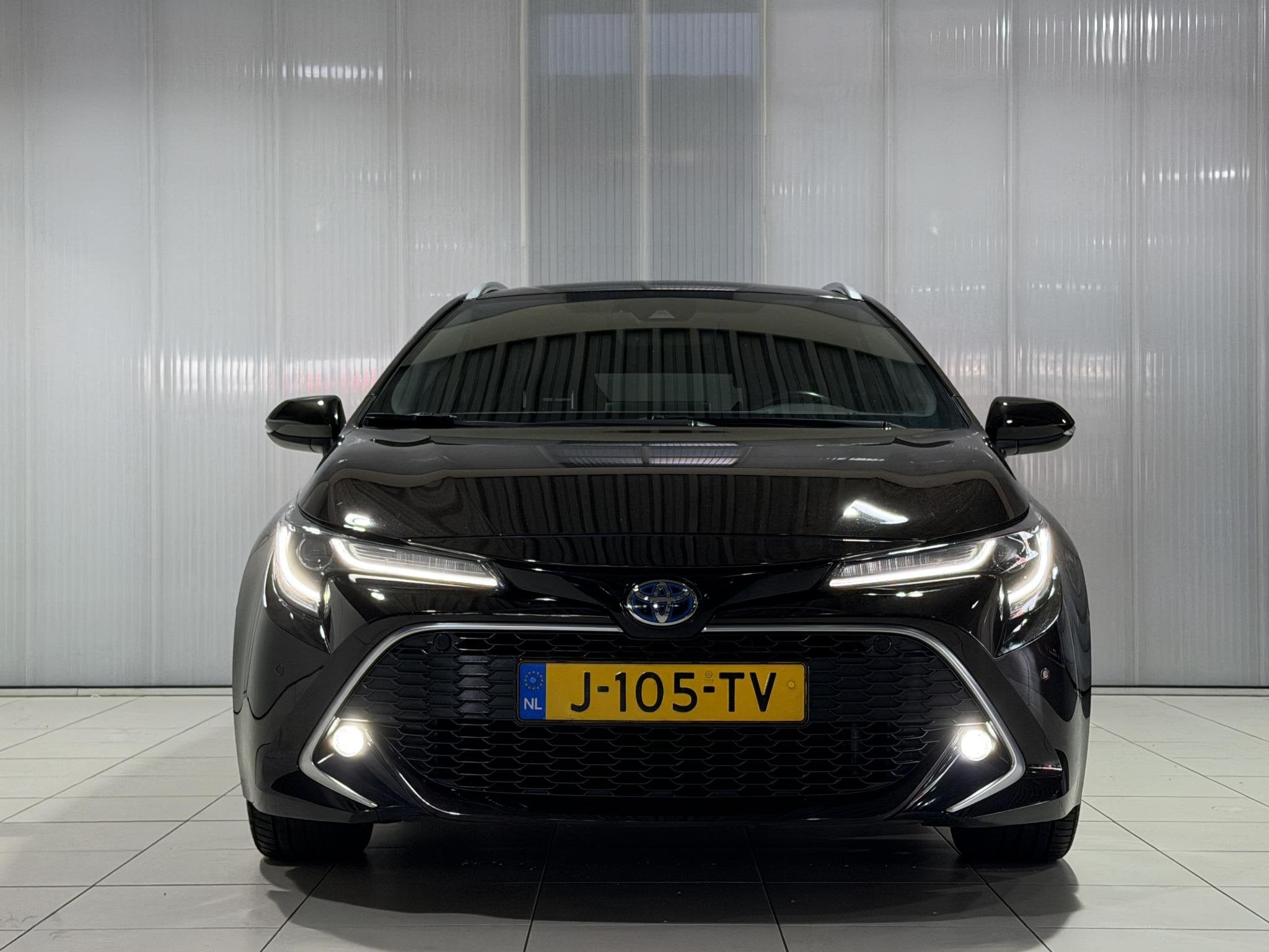 Toyota Corolla Touring Sports 1.8 Hybrid Executive Trekhaak, Auto's, Gebruikt, 4 cilinders, Bruin, Corolla