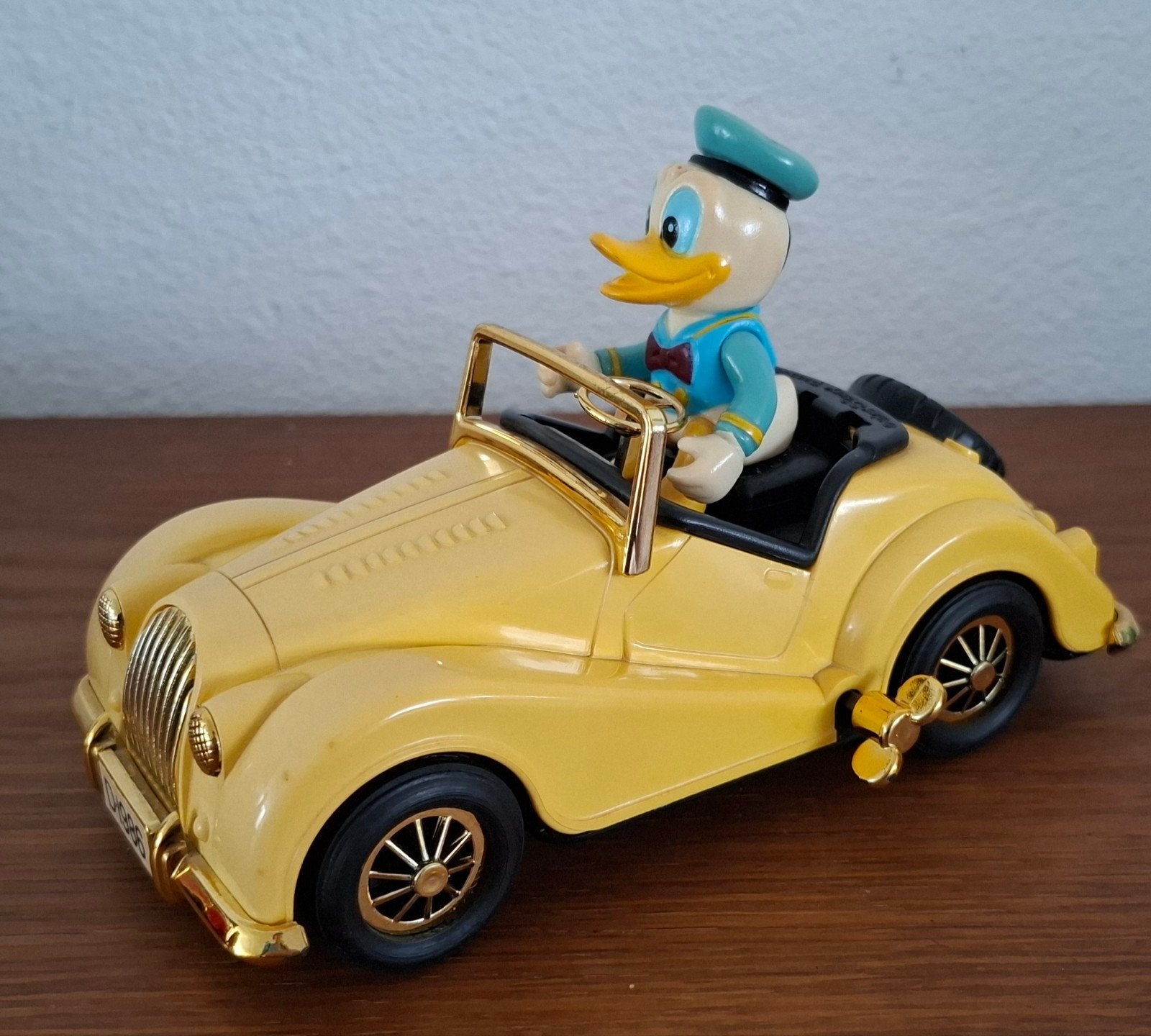 Vintage Masudaya Donald Duck Opwindauto Morgan 1986, Ophalen of Verzenden, Donald Duck, Zo goed als nieuw, Beeldje of Figuurtje