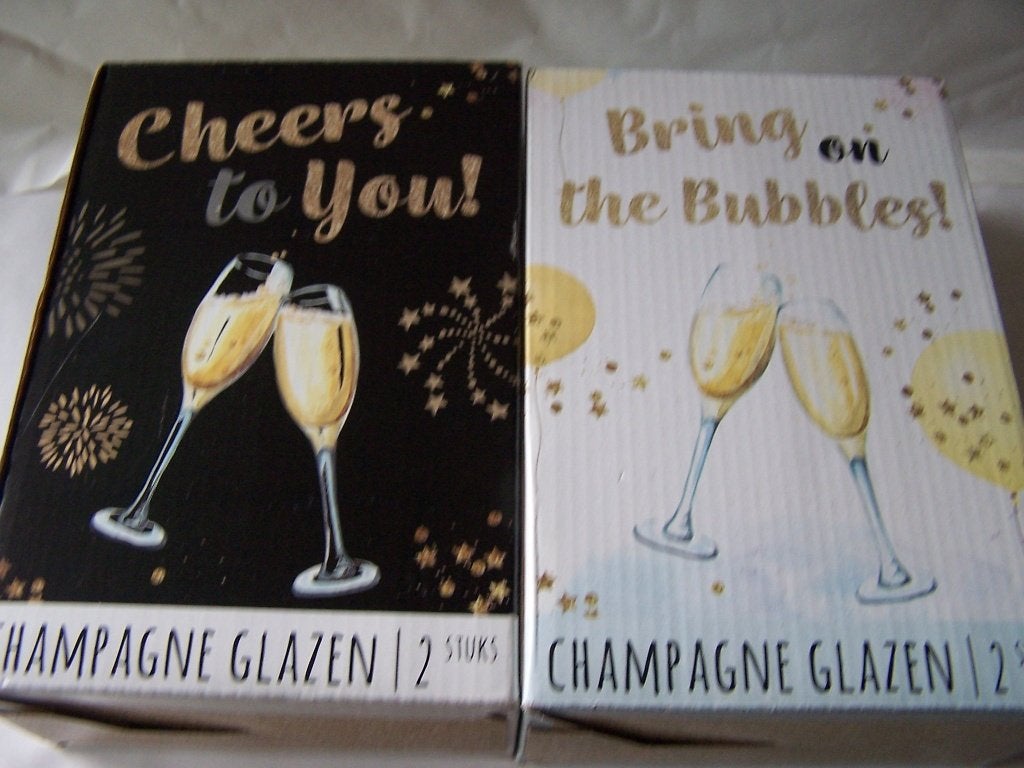 4 Champagne glazen in doos. Zie foto's., Ophalen of Verzenden, Zo goed als nieuw, Overige typen