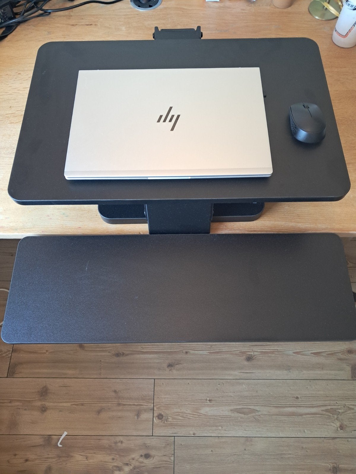 Updesk gasveer zit-sta verhoger, Ophalen