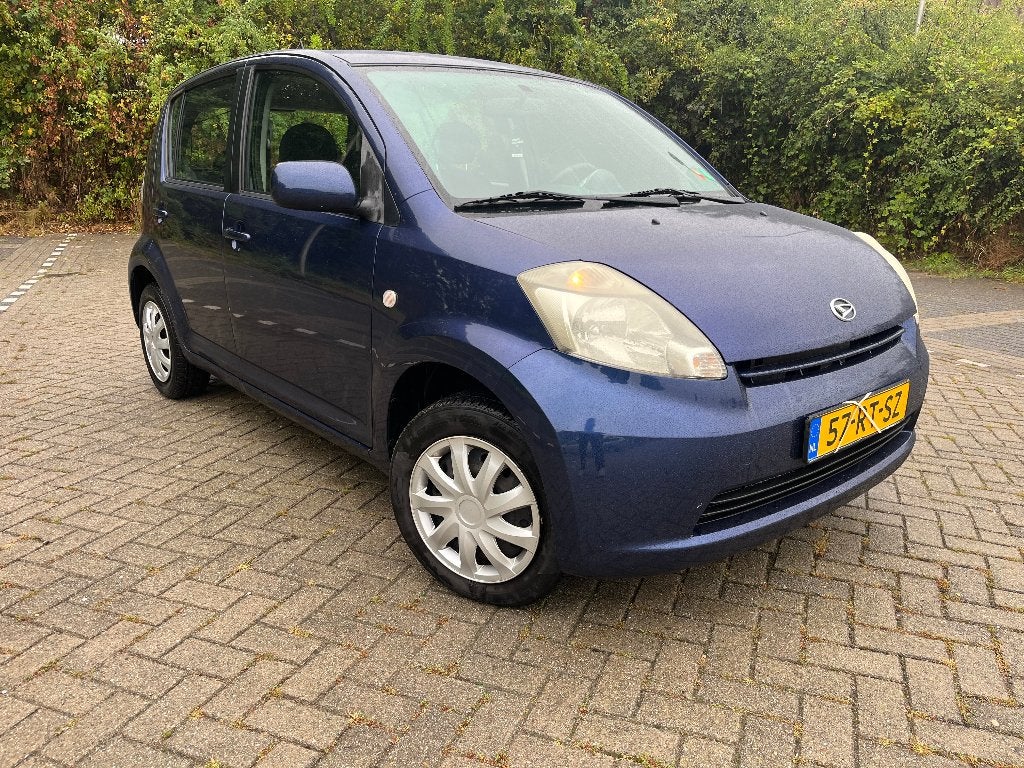 Daihatsu Sirion 2 1.3 2005 Blauw, Auto's, Daihatsu, Voorwielaandrijving, Stof, 40 €/maand, 4 cilinders