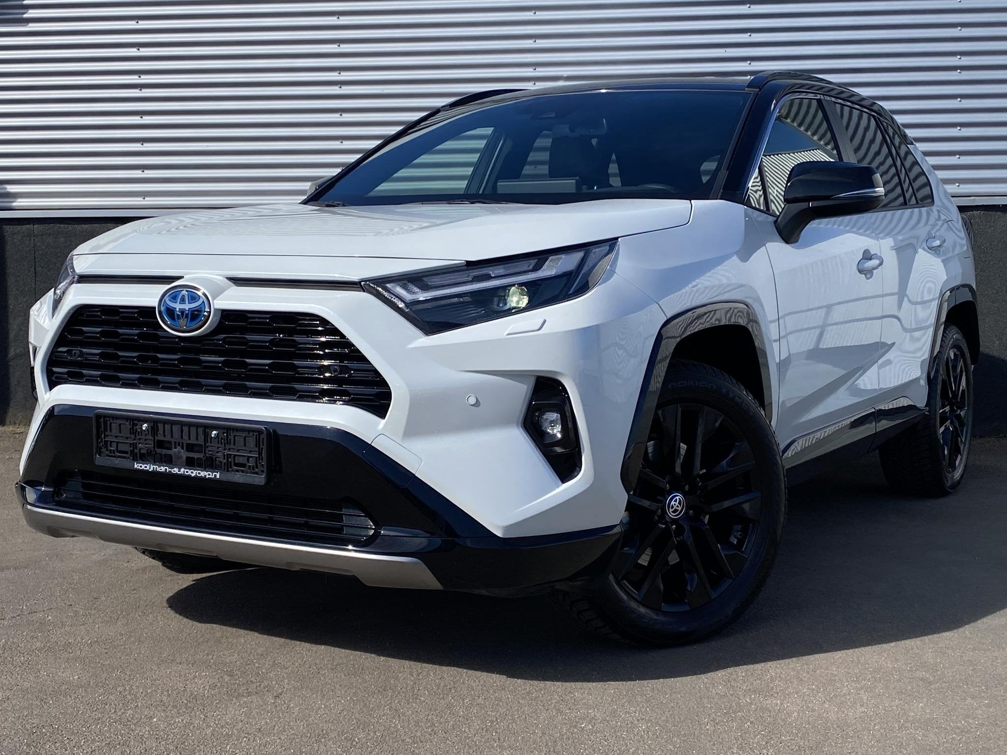 Toyota RAV4 2.5 Hybrid AWD Bi-tone edition Parelmoer, naviga, Automaat, Dealer onderhouden, Gebruikt, Euro 6