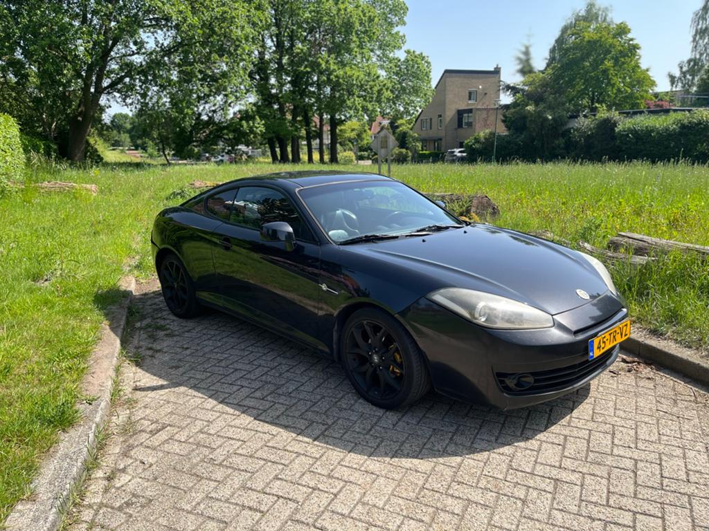 Hyundai Coupé 2.0 2007 Zwart |Geen apk|, Auto's, 1287 kg, 4 stoelen, Zwart, Origineel Nederlands