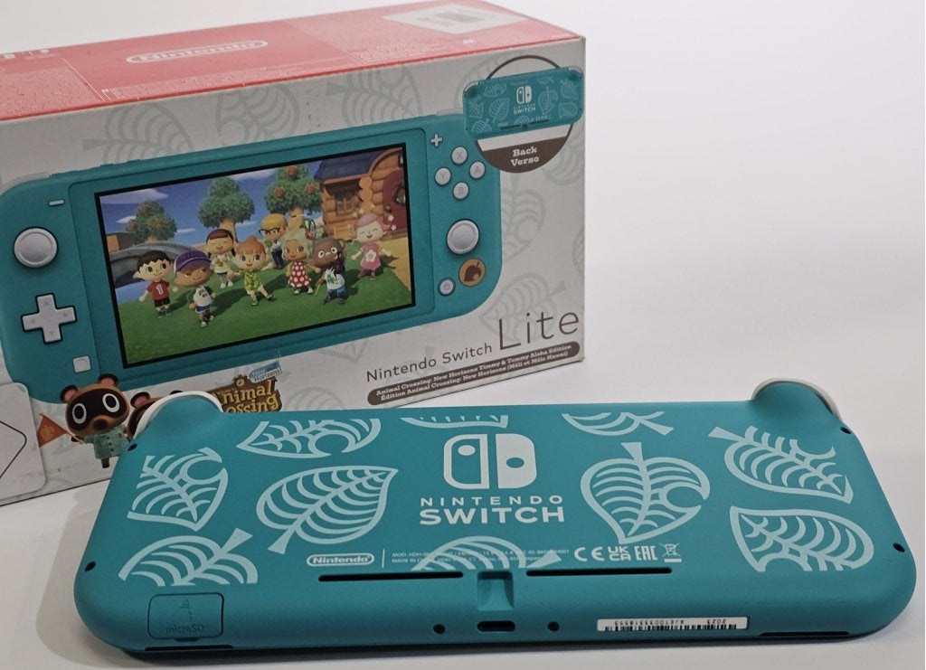 Nintendo Switch Lite - Turquoise | Retourdeal, Spelcomputers en Games, Contact@nintendo.nl, Turquoise, Ophalen of Verzenden, Zo goed als nieuw