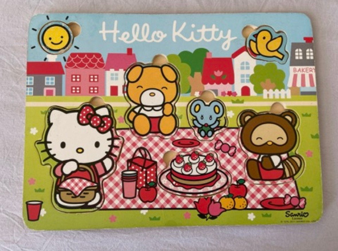 Houten puzzel Hello Kitty, Kinderen en Baby's, Gebruikt, Ophalen of Verzenden, Van hout, Minder dan 10 stukjes