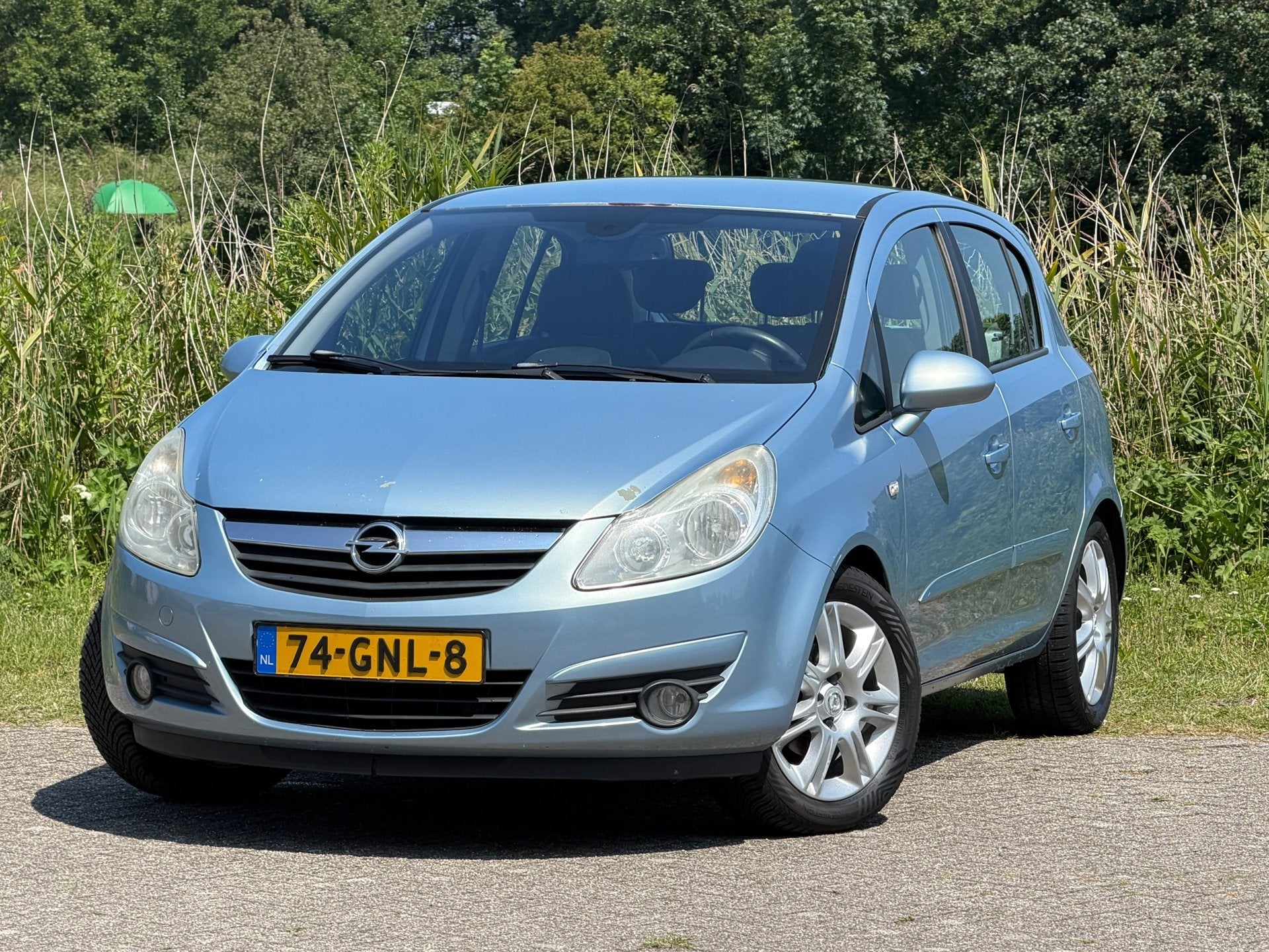 Opel Corsa 1.4-16V Cosmo | Ice Blue | Cruise/Fietsendrager/A, Auto's, Voorwielaandrijving, 4 cilinders, Blauw, 49 €/maand