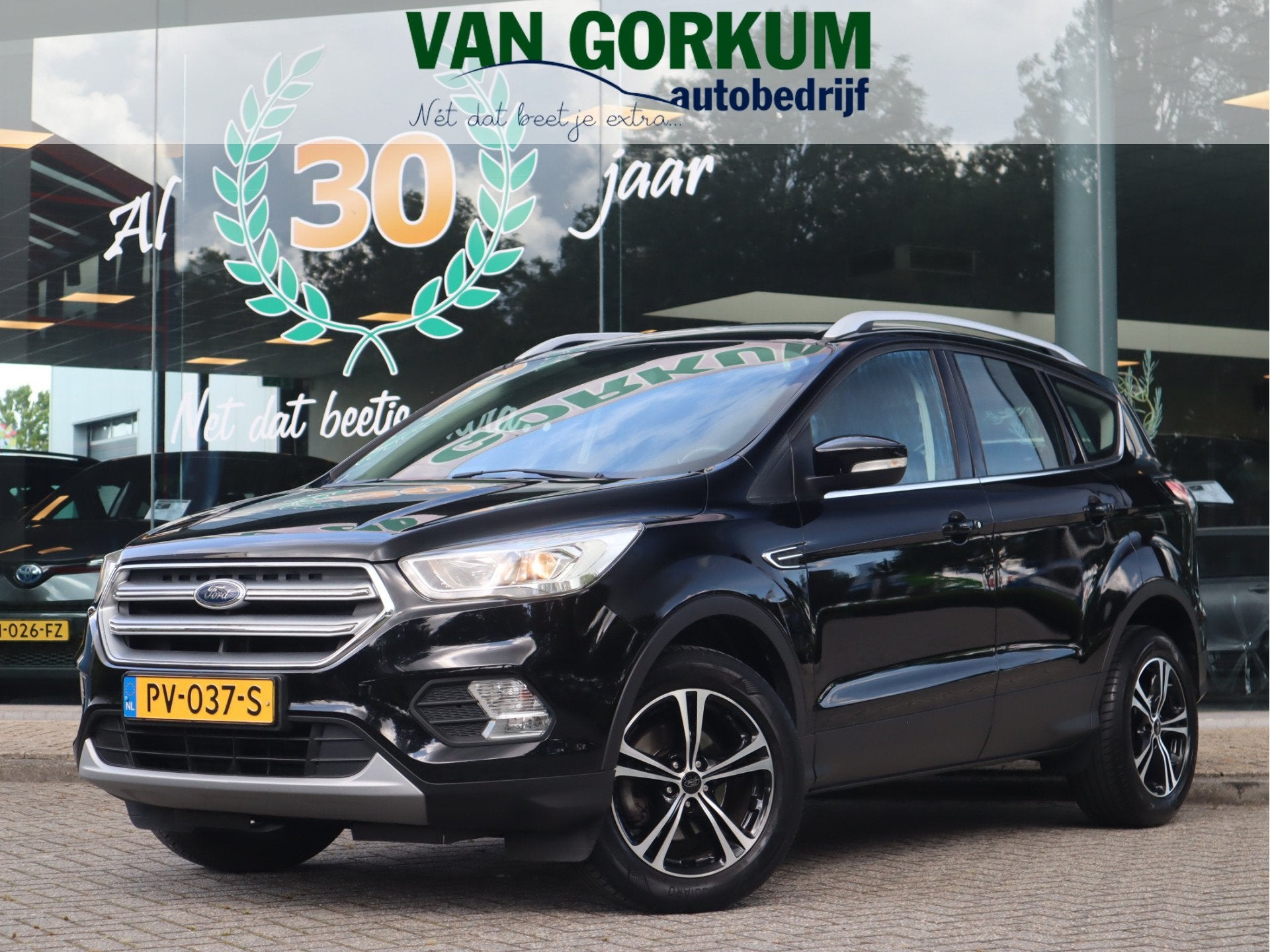 Ford Kuga 1.5 Ecoboost Trend Ultimate Navi / Pdc / Cruise /, Auto's, Stof, 4 cilinders, Zwart, Origineel Nederlands