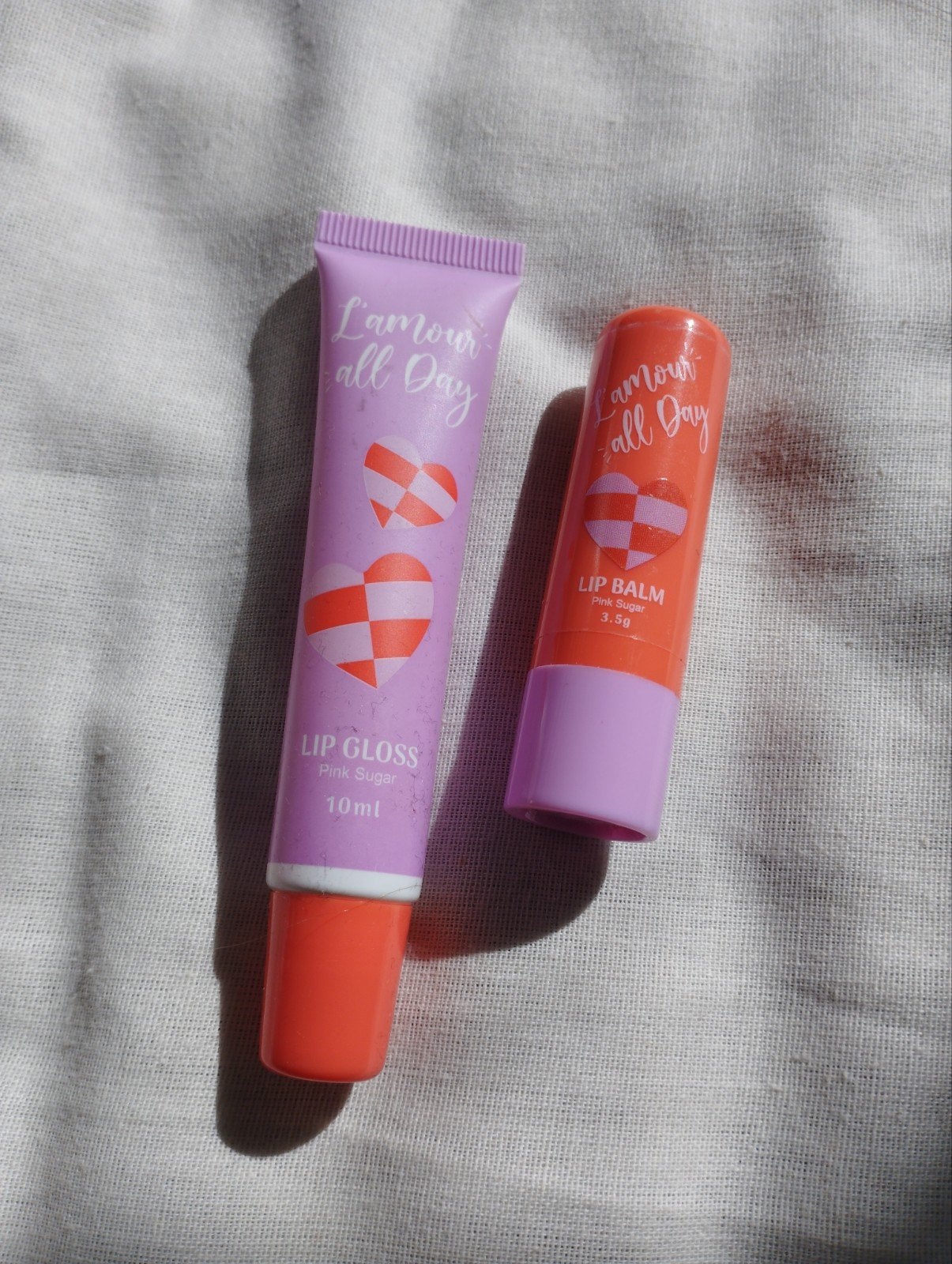 L'amour all Day Lip Balm & Lip Gloss Pink Sugar Set, Ophalen, Lippen, Nieuw, Make-up