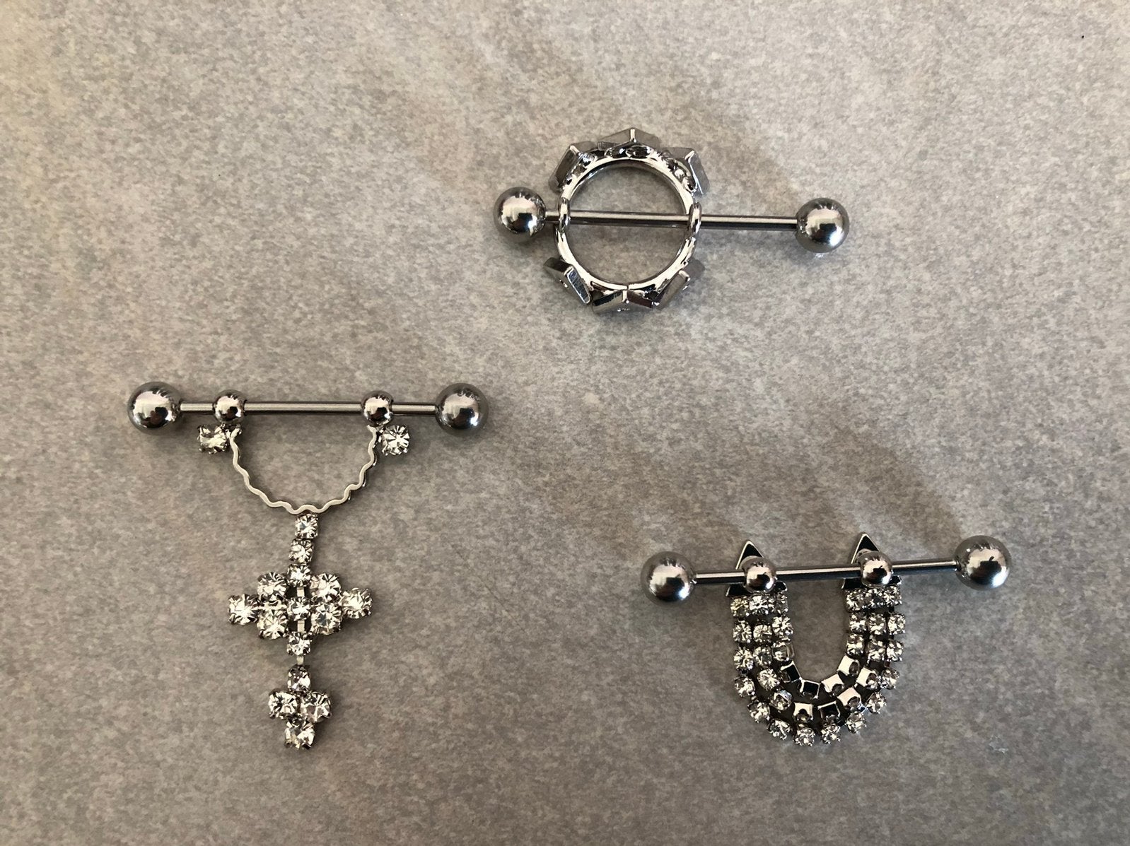 Partij van 75 tepelpiercings, Staal, Overige typen, Nieuw, Ophalen of Verzenden