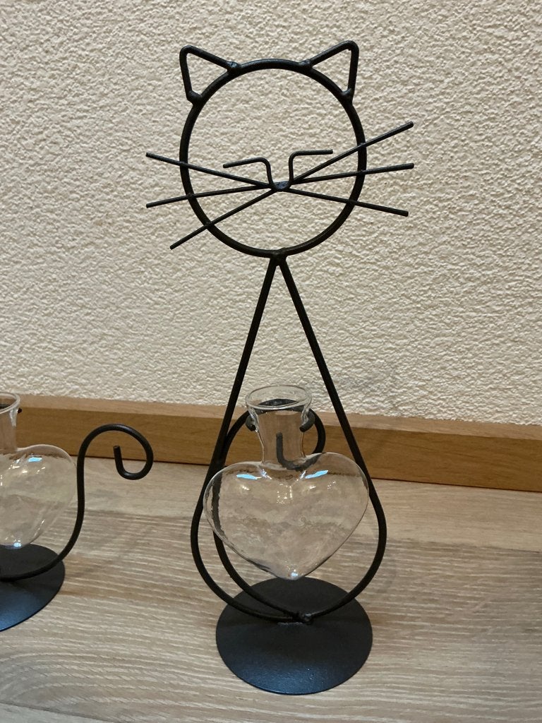Te koop aangeboden 2 metalen katten met glazen hart., Ophalen of Verzenden, Zo goed als nieuw, Zwart, Metaal