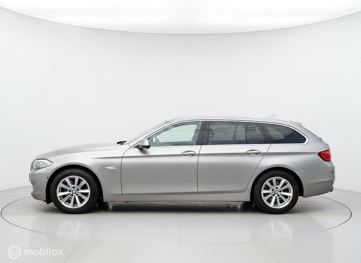 BMW 5-serie Touring 520i High Executive Xenon HUD 360 Camera, Euro 5, Achterwielaandrijving, Gebruikt, Zwart