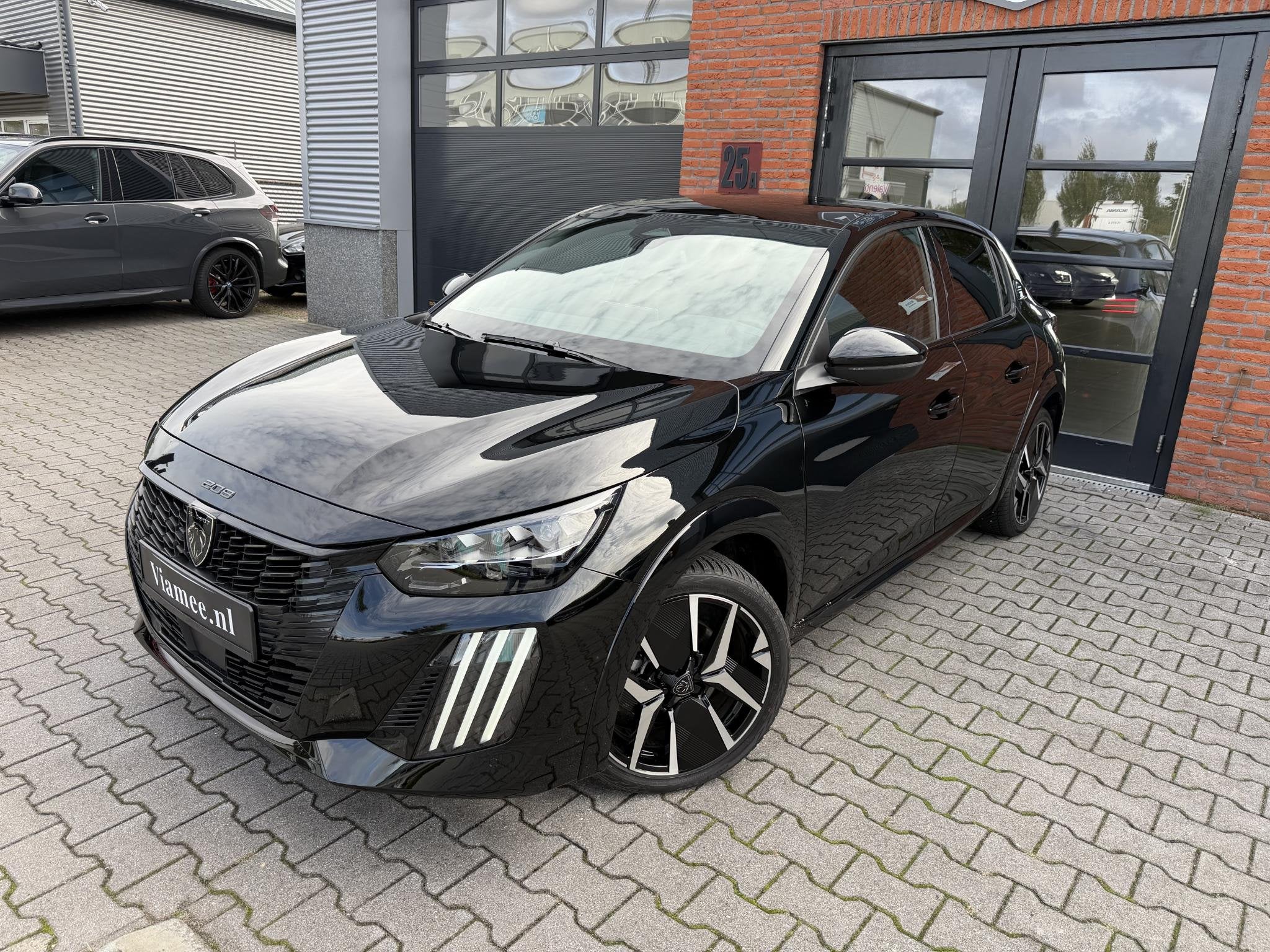 Peugeot e-208 EV GT Avantage 51 kWh | Pano | Massage | Warmt, Auto's, Dealer onderhouden, Gebruikt, 433 km, 156 pk