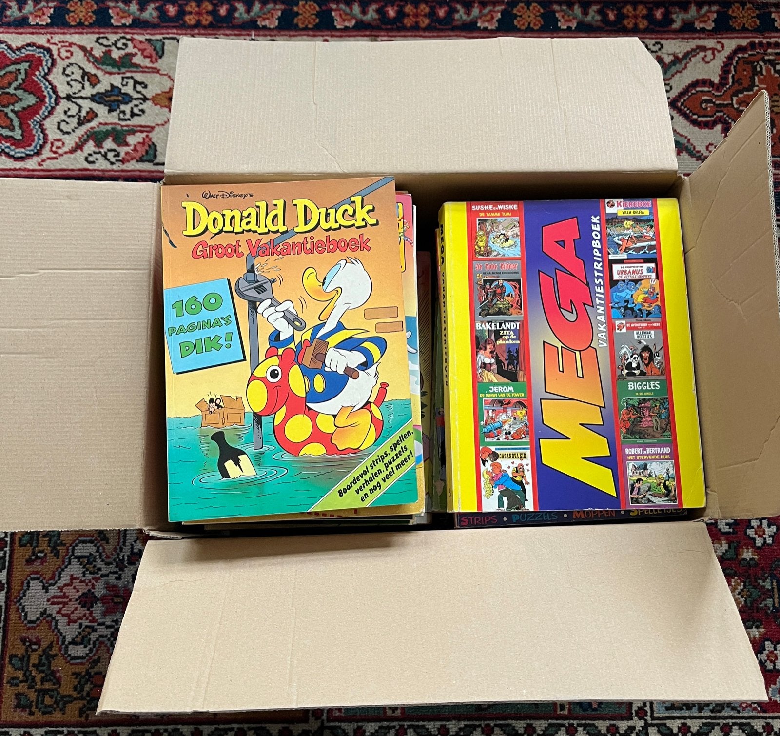 Doos vol Donald Duck Vakantieboeken en Mega boeken, Boeken, Meerdere stripboeken, Ophalen, Gelezen