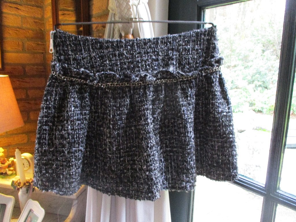 mj/NIKKIE/kort rokje/TWEED/zwart/wit/zilver maat 40, Maat 38/40 (M), Zo goed als nieuw, Nikkie, Boven de knie