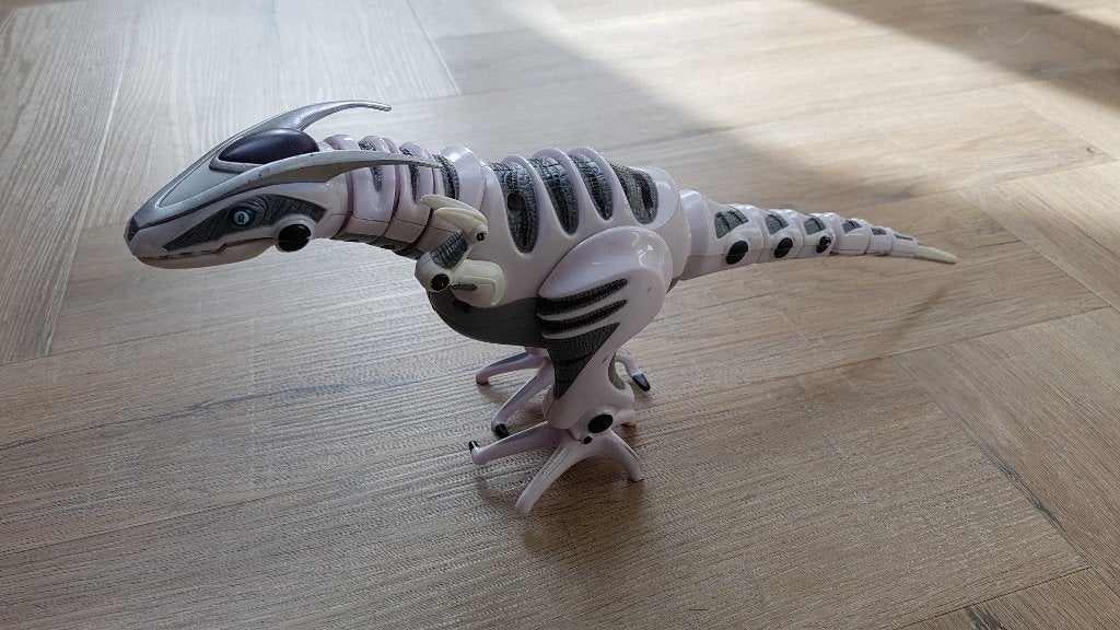 DINO zelflopend WowWee Robotics Roboraptor, Ophalen of Verzenden, Gebruikt