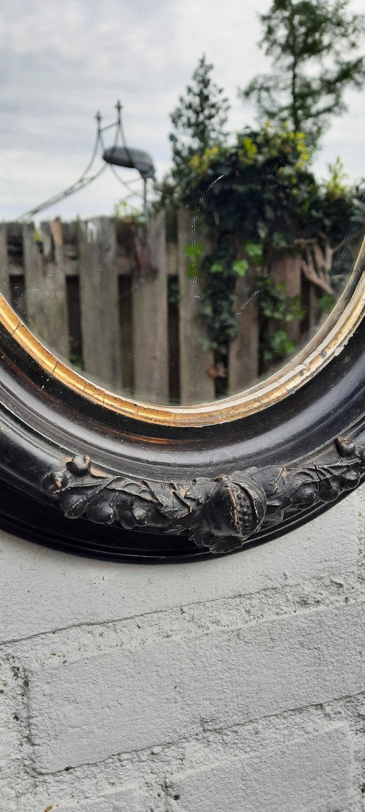 Antieke ovalen spiegel met decoratieve lijst, Ophalen of Verzenden, Ovaal, Minder dan 50 cm