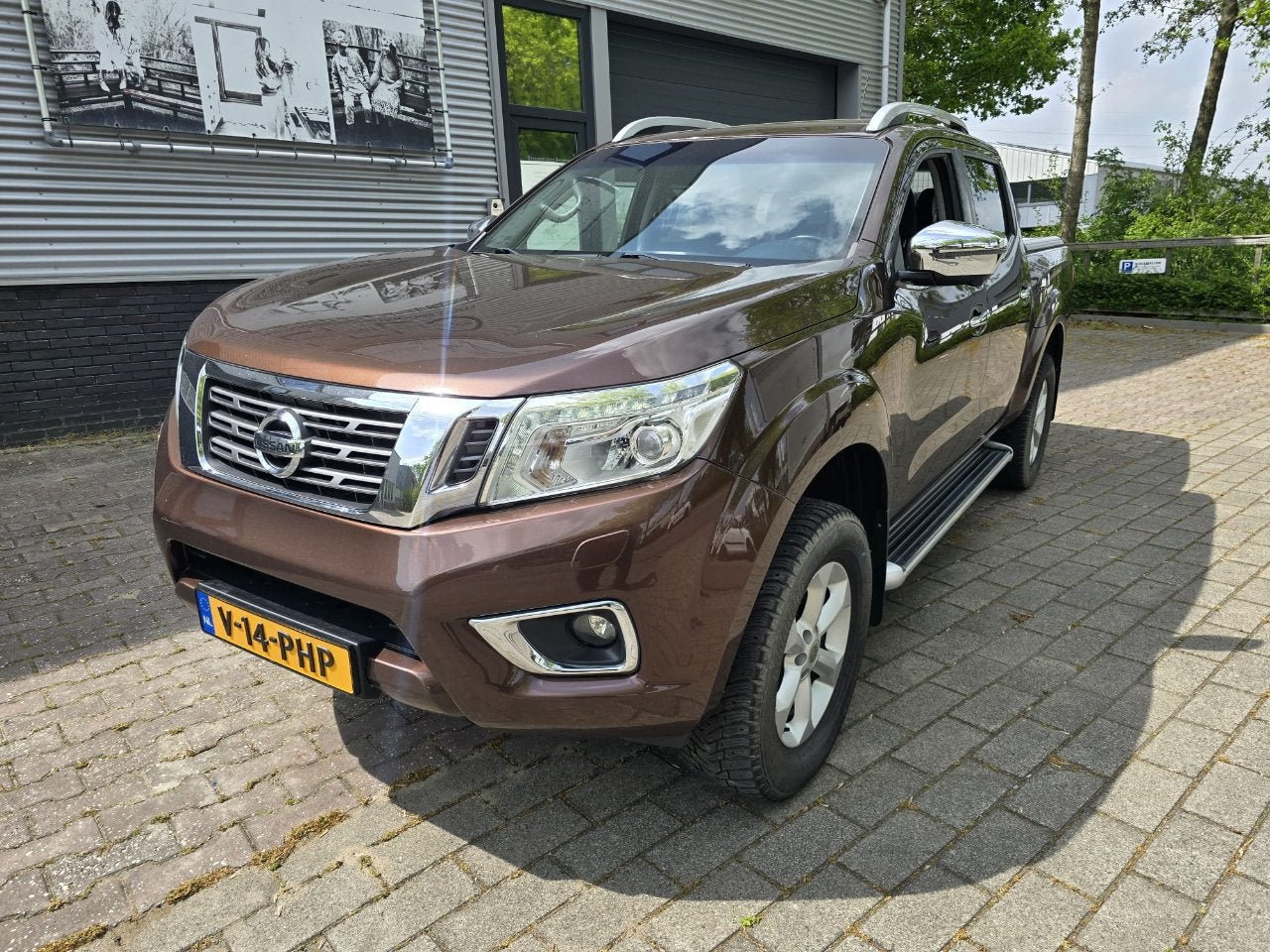 Nissan NP300 NAVARA 2.3Ci TEKNA DOUBLE CAB SNOEKS (bj 2016), Automaat, Gebruikt, Parkeersensor, Bedrijf