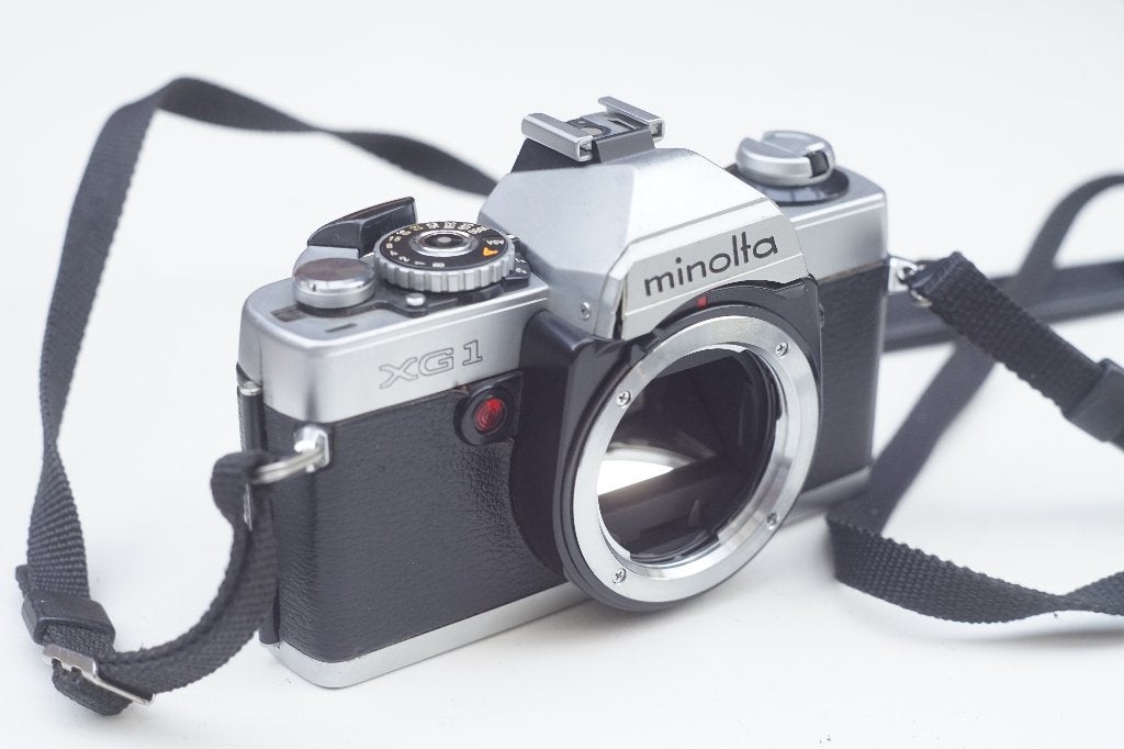 Minolta XG1 (met Minolta riem) ) “for parts”  -> 9,99€, Audio, Tv en Foto, Fotocamera's Analoog, Ophalen of Verzenden, Spiegelreflex