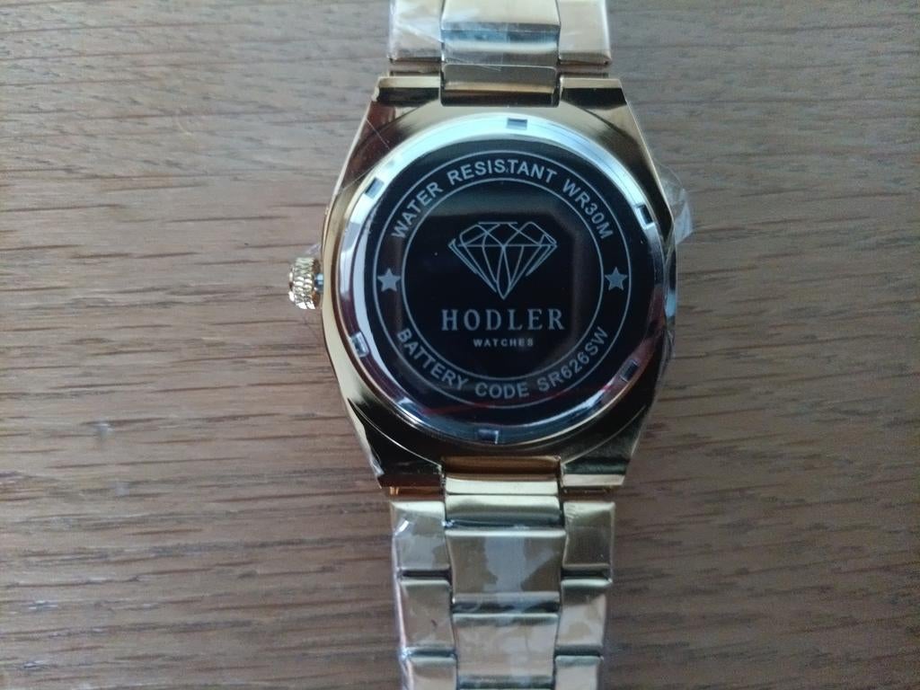 Hodler horloge, goudkleurig, nieuw in verpakking, Overige merken, Overige materialen, Polshorloge, Overige materialen