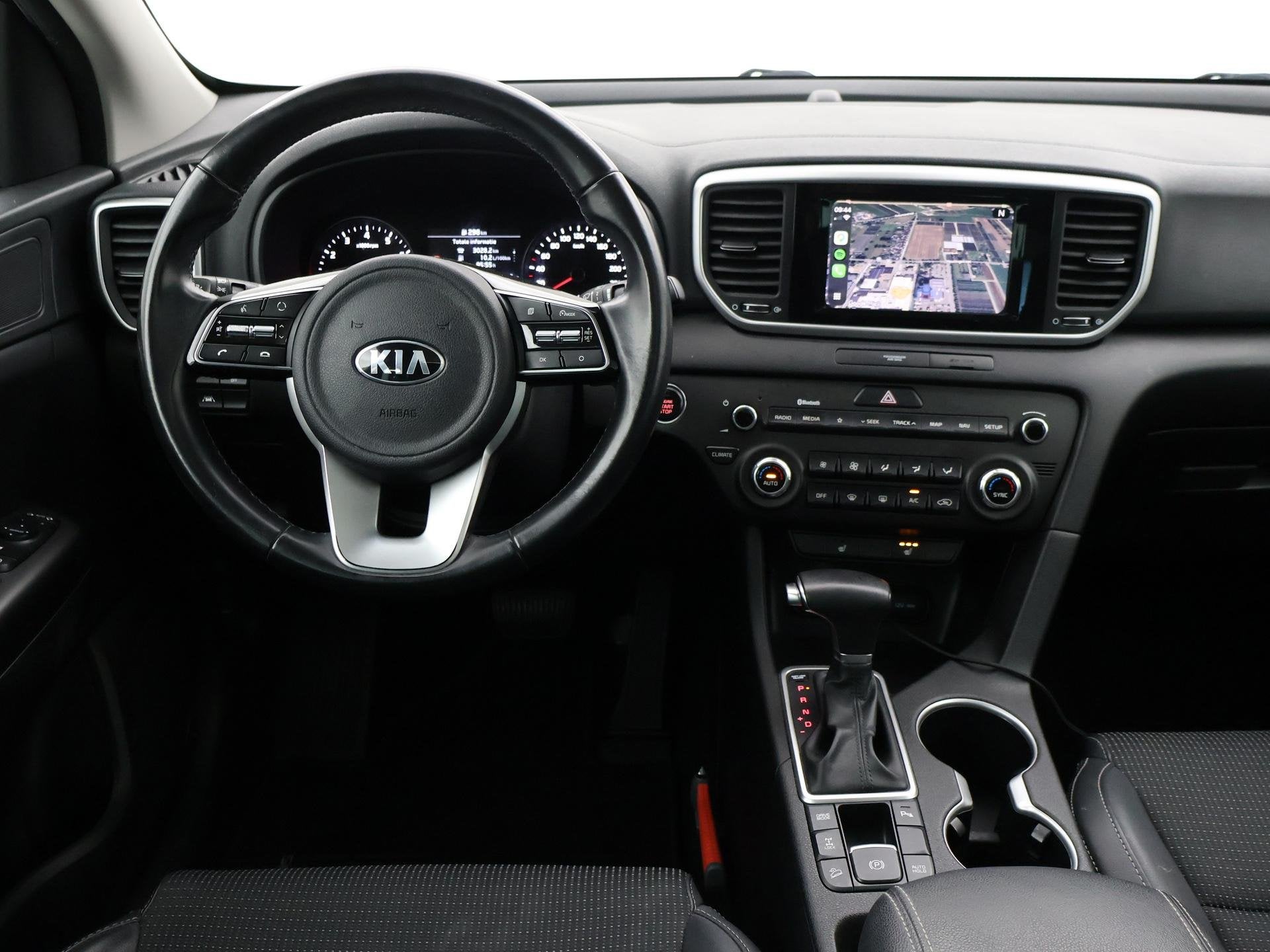 Kia Sportage 1.6 T-GDI 4WD 177 PK AUT. DYNAMICPLUSLINE + PAN, Auto's, Automaat, Gebruikt, 4 cilinders, Leder en Stof