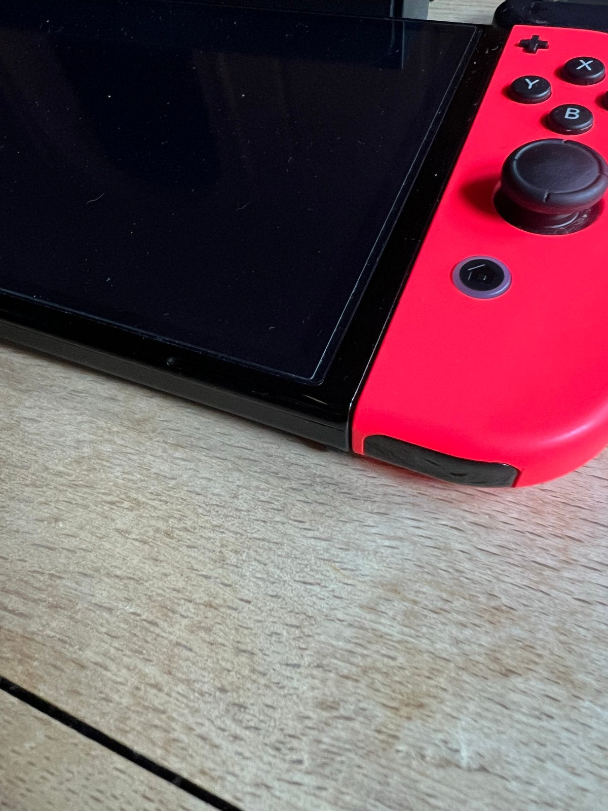 Foto 5 van Nintendo Switch Oled met accessoires en games