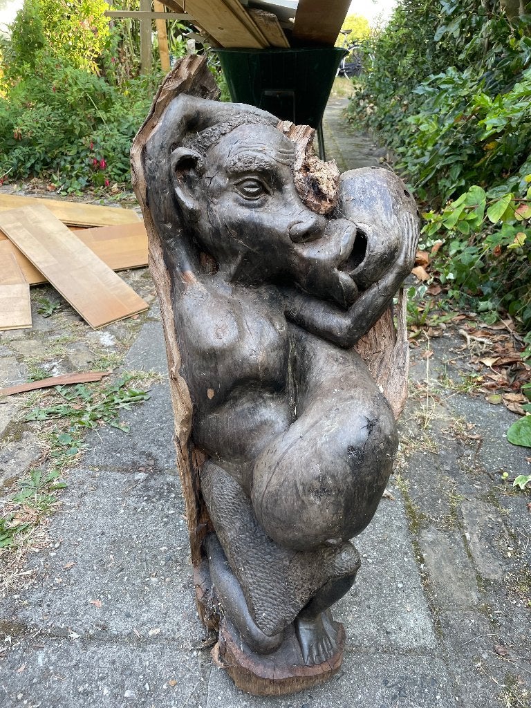 Houten beeld, Ophalen