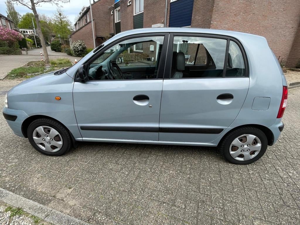 Hyundai Atos 1.1 (2004) • 132.000 km • Grijs., Auto's, Voorwielaandrijving, 31 €/maand, 4 cilinders, Origineel Nederlands