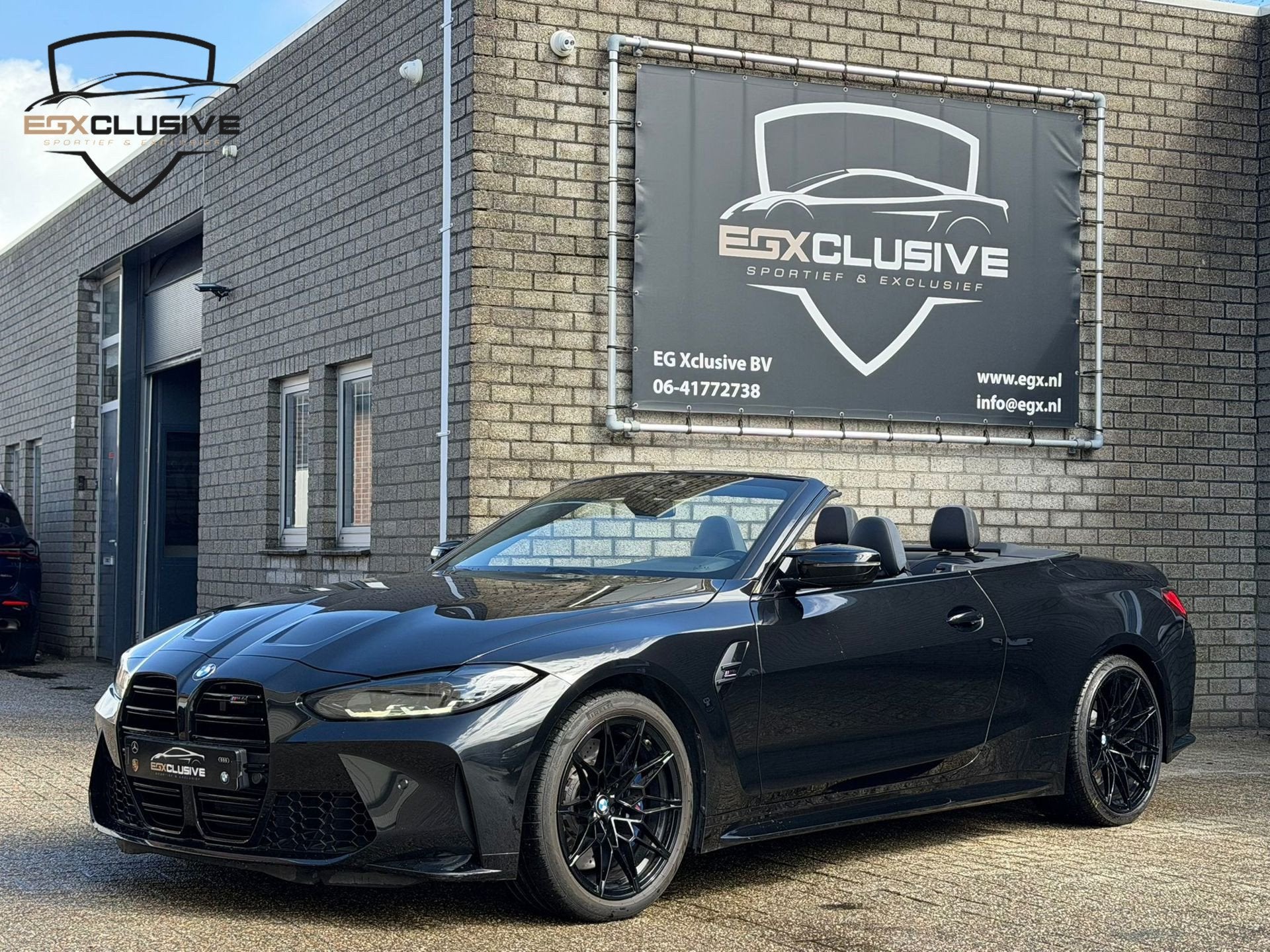 BMW M4 Competition xDrive Cabrio CARBON|H&K|, Auto's, BMW, Gebruikt, Zwart, 4-Serie, Cabriolet