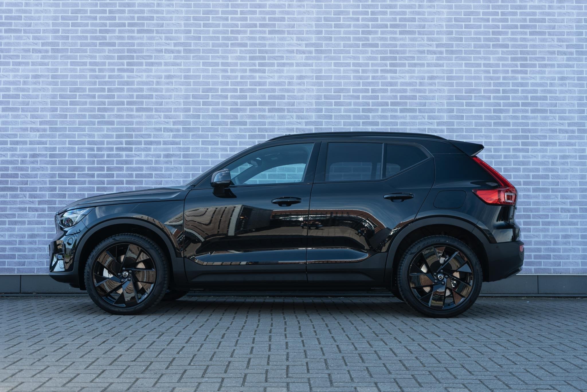 Volvo EX40 Single Motor Extended Range Ultra 82 kWh | Black, Auto's, Automaat, 12 maanden, Achterwielaandrijving, Leder en Stof