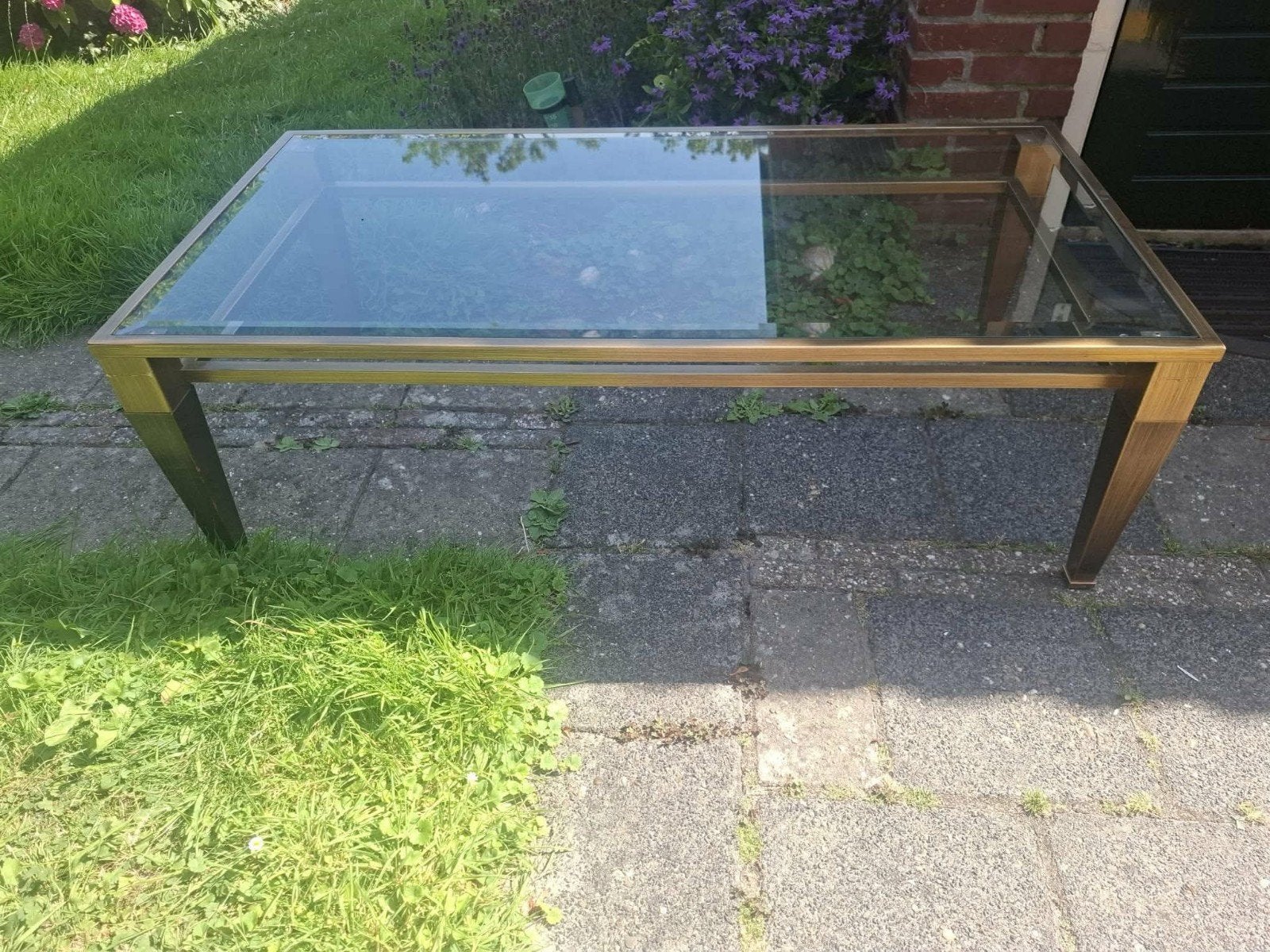 Glazen salontafel met messing frame, Ophalen of Verzenden, Zo goed als nieuw, 100 tot 150 cm, 50 tot 100 cm