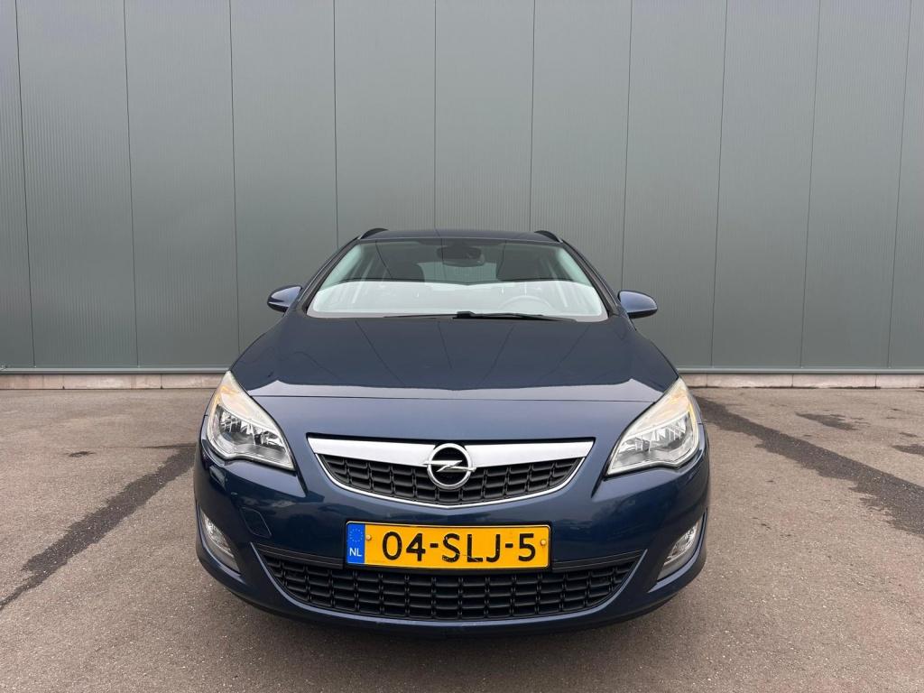 Opel Astra Sports Tourer 1.4 Turbo Edition ONDERHOUDSBOEKJE, Auto's, Euro 5, 15 km/l, 4 cilinders, Blauw