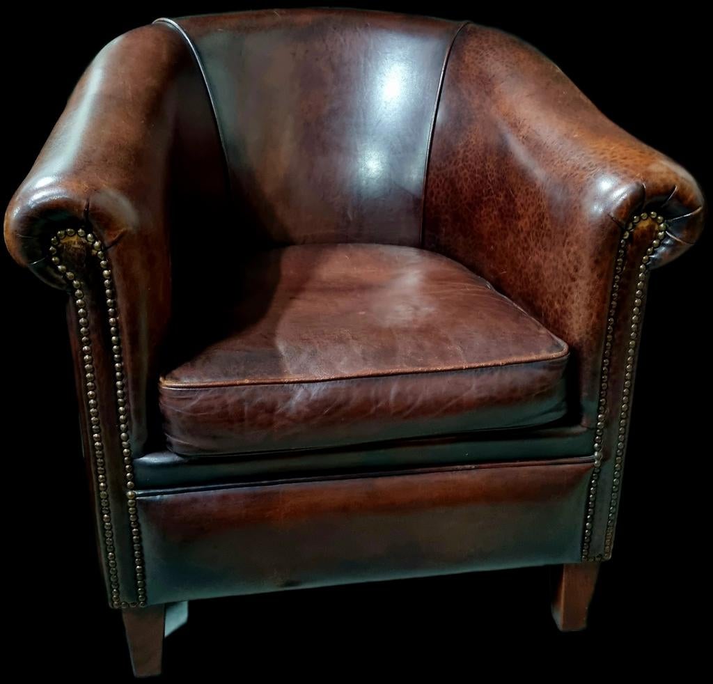 Schapenleren club fauteuil rood bruin + BEZORGING GRATIS