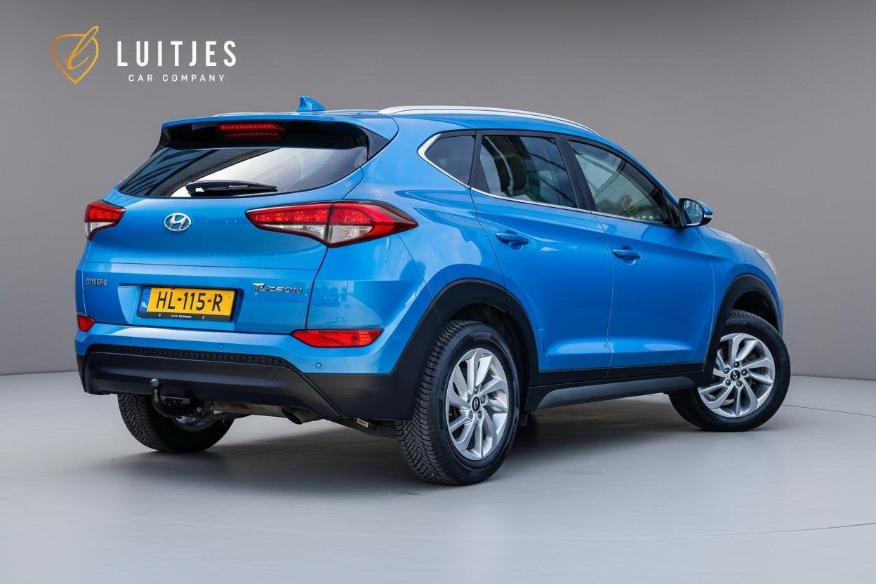 Hyundai Tucson 1.6 GDi Comfort OrgNL|Camera|Navi|Stoelverw.|, Auto's, Voorwielaandrijving, Dealer onderhouden, Stof, Gebruikt