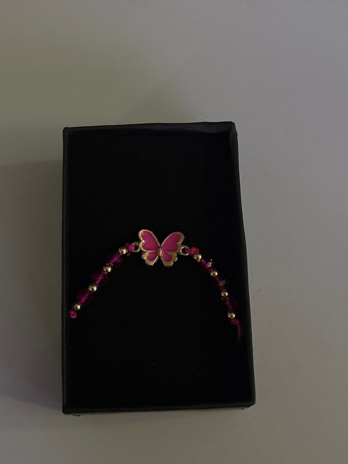Vlinder armbandje roze pink one 2, Sieraden, Tassen en Uiterlijk, Armbanden, Overige materialen, Nieuw, Ophalen of Verzenden, Roze