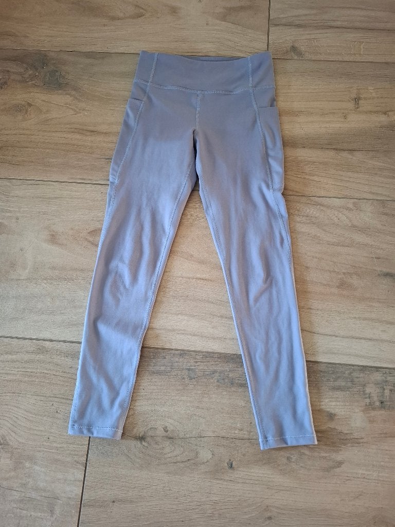 H&M Move sportlegging lila - maat 134/140 - als nieuw, Ophalen of Verzenden, Zo goed als nieuw, Meisje, Sport- of Zwemkleding