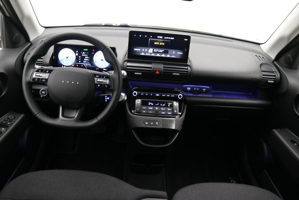 Hyundai INSTER Evolve 49 kWh Winter & Tech Pack / Warmtepomp, Auto's, Hyundai, 1328 kg, Stof, Zwart, 116 pk