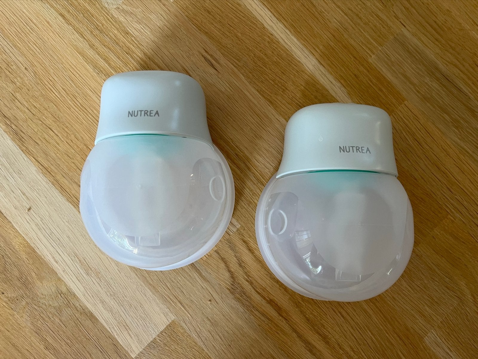 Nutrea handsfree borstkolf met reserve-onderdelen, Ophalen, Zo goed als nieuw