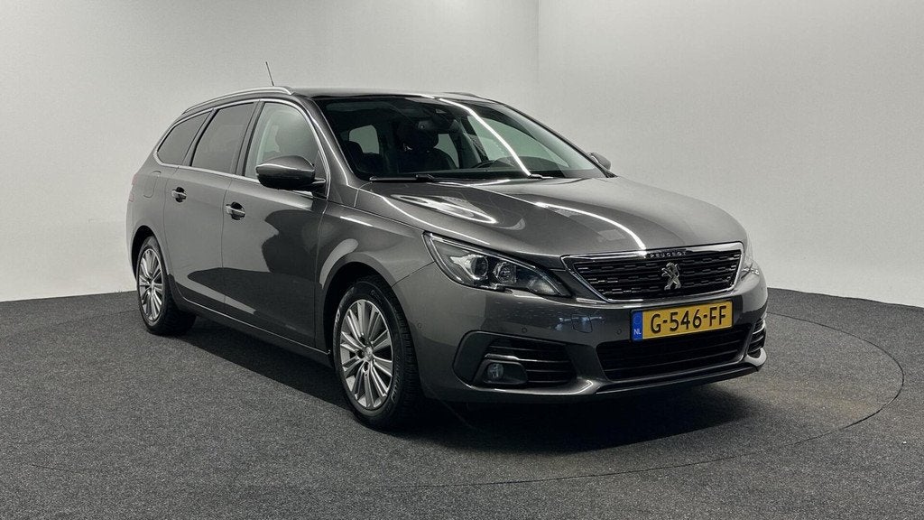 Peugeot 308 SW 1.2 PureTech Blue Lease Premium TREKHAAK CARP, Auto's, Peugeot, Voorwielaandrijving, Gebruikt, 1199 cc, Met garantie (alle)