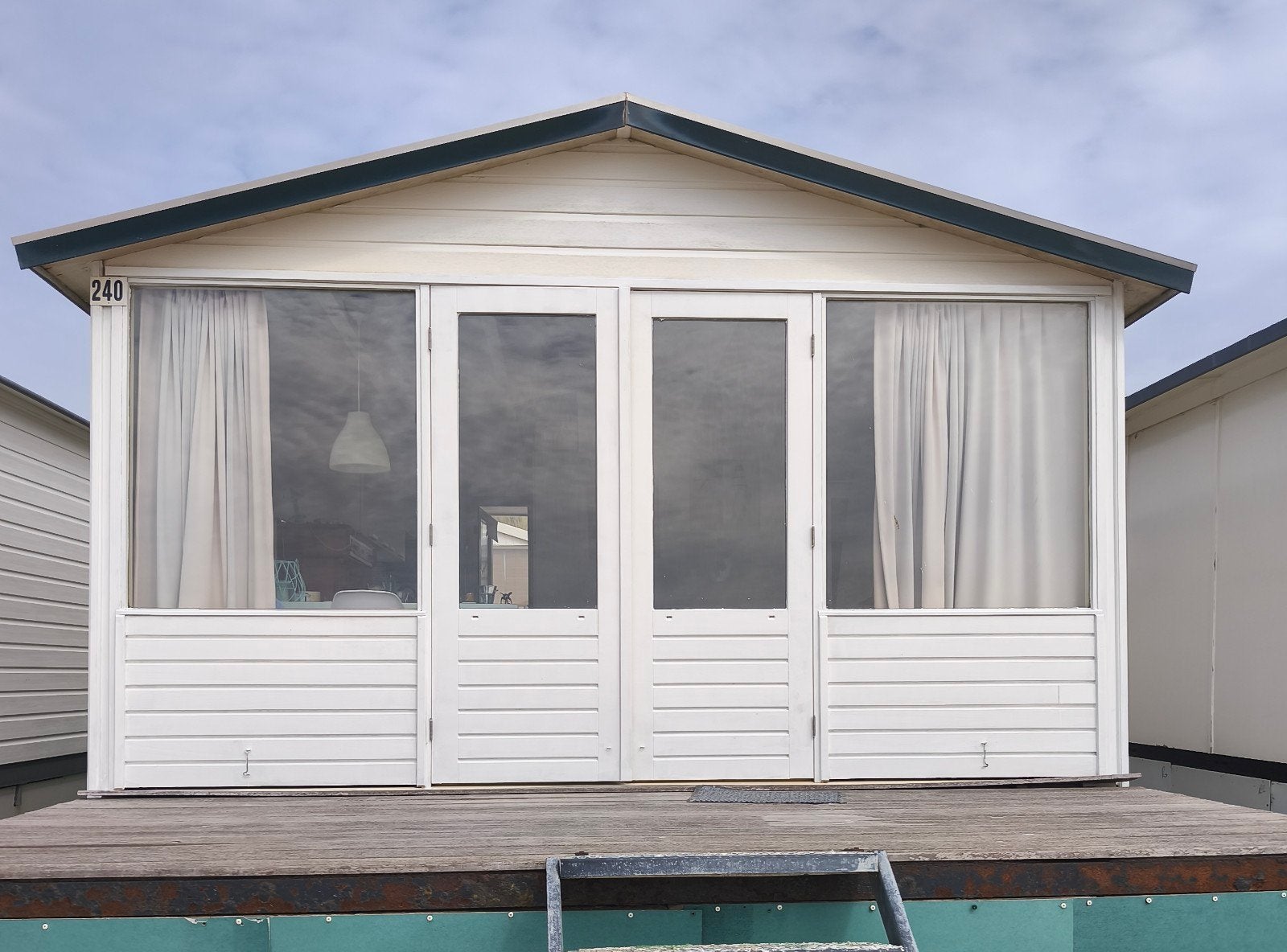 Strandhuisje, strandhuis te huur, op het strand van IJmuiden, Ophalen