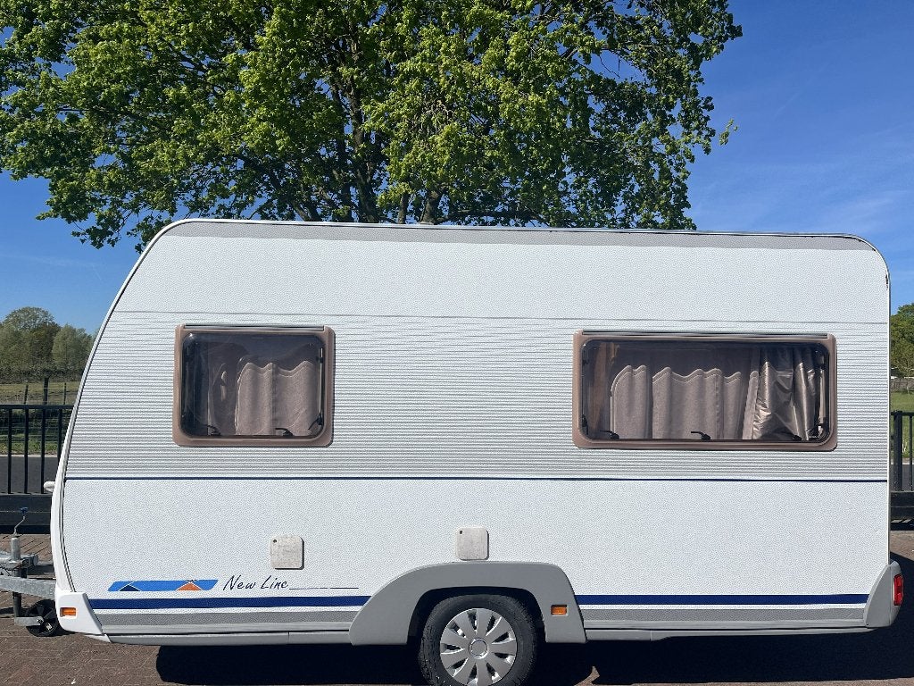 Mooie Dethleffs Camper 420, Caravans en Kamperen, Caravans, Bedrijf, tot en met 4, 750 - 1000 kg, Treinzit, Dethleffs, Vast bed