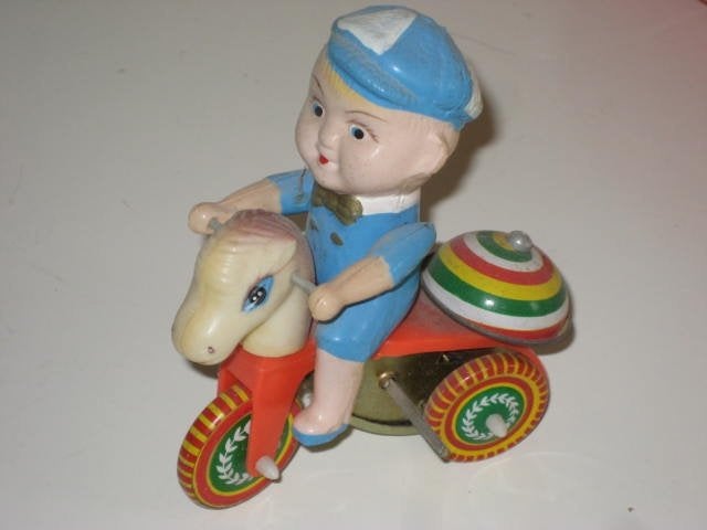 Blikken speelgoed jongetje op fiets opwindspeelgoed Vintage, Ophalen of Verzenden, Gebruikt