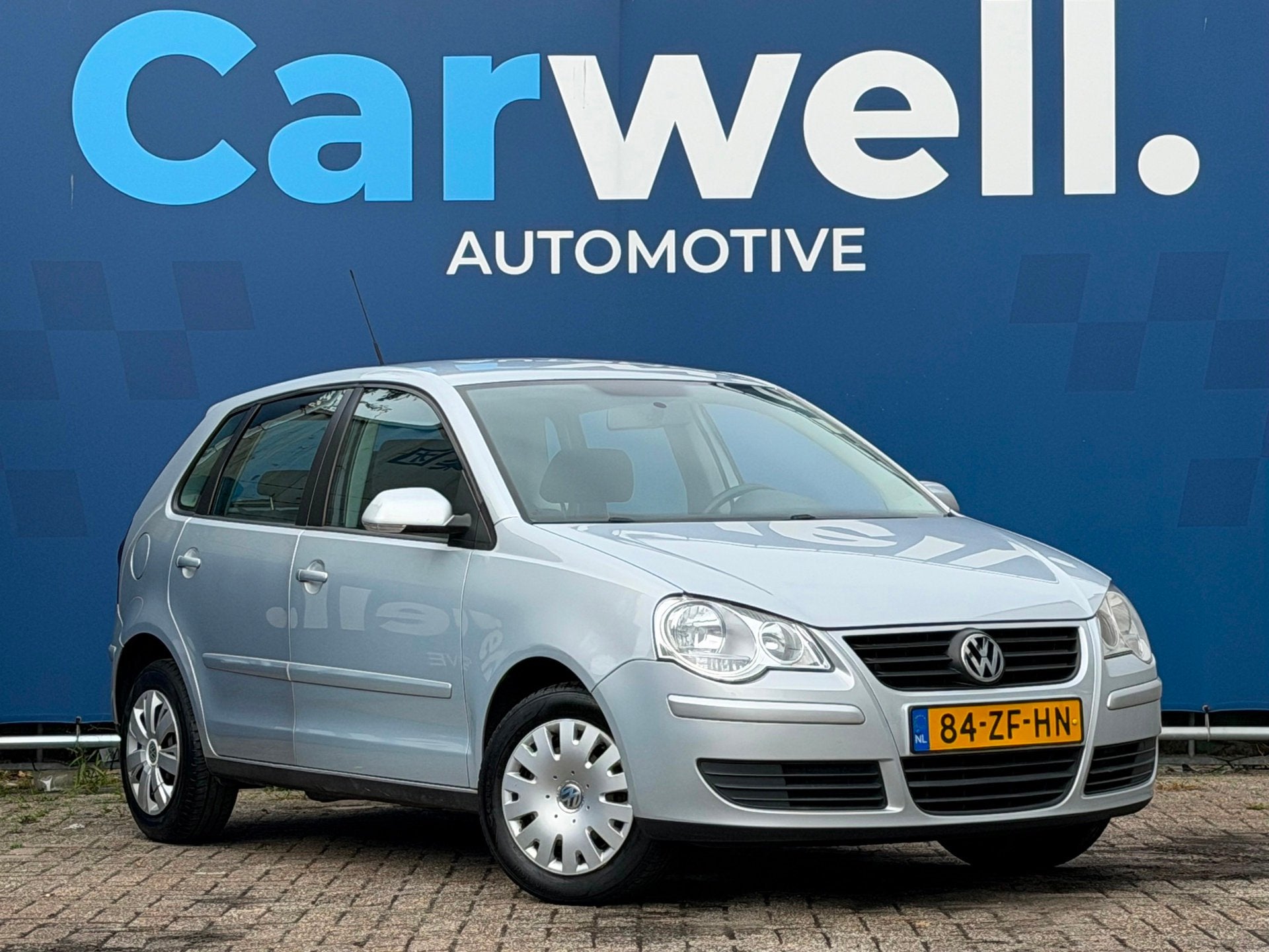 Volkswagen Polo 1.4-16V Optive|1e Eigenaar|NieuweAPK!|Airco|, Auto's, Voorwielaandrijving, Dealer onderhouden, Stof, Zwart