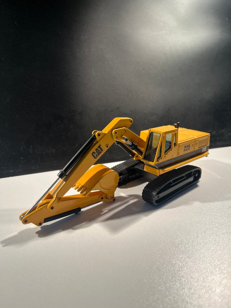 Caterpillar graafmachine, Ophalen of Verzenden, Zo goed als nieuw, Bus of Vrachtwagen, Overige merken