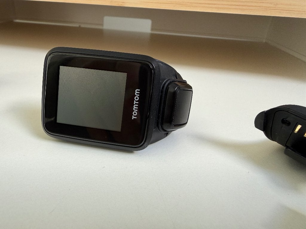 tom tom sporthorloge met GPS en headphones, Gebruikt, Zwart, Ophalen of Verzenden, Waterdicht