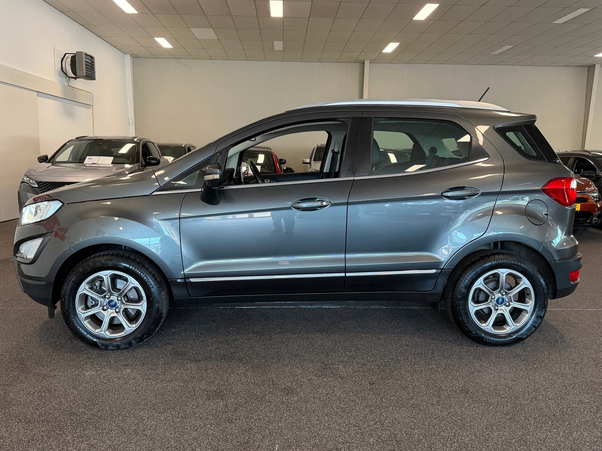 Ford EcoSport 1.0 EcoBoost TITANIUM, LEER, NAVIGATIE, LED, C, Auto's, Voorwielaandrijving, Dealer onderhouden, 125 pk, Gebruikt
