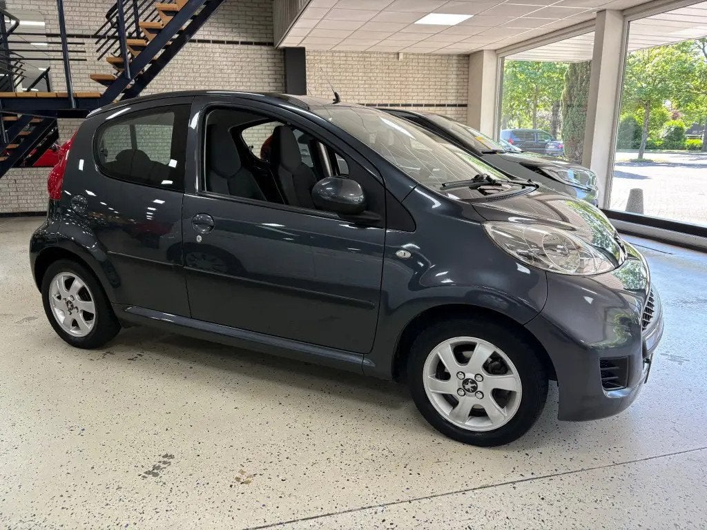 Peugeot 107 1.0 Millesim Airco Parkeersensor NL € 6.250,00, Automaat, Gebruikt, 4 stoelen, 68 pk